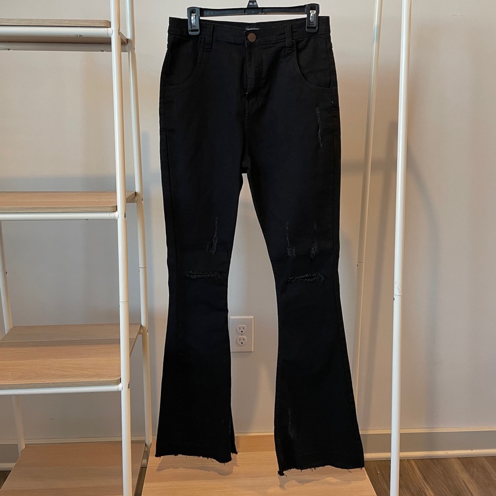 Distressed flare jeans